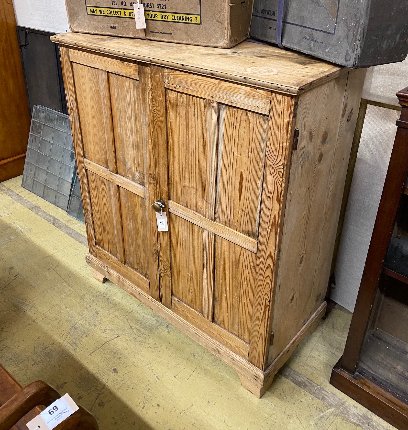 A Victorian pale pine two door side cabinet, width 95cm, depth 44cm, height 107cm